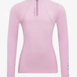 A soft pink lemieux classique base layer fondant long sleeve top with quarter zip and subtle chest branding