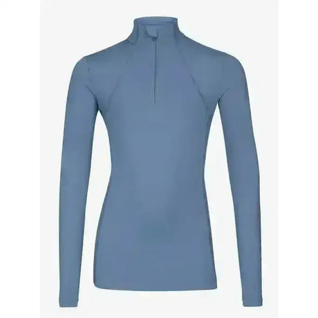 A sleek light blue lemieux classique base long-sleeved athletic top with high collar and half-zip front perfect for layering