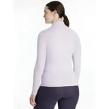 A soft lavender lemieux classique base layer lilac long-sleeve top with a sleek high-neck and form-fitting design