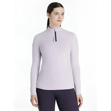 Light purple long-sleeved lemieux classique base layer lilac with black collar zipper and subtle left chest branding