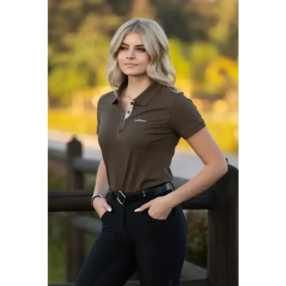 Dark olive green lemieux classique polo shirt with button-down front and subtle white chest embroidery, quick-drying classique polo