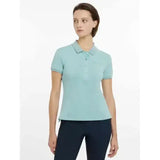 A light blue lemieux classique polo shirt aqua with short sleeves classic collar and buttoned front perfect for casual wear
