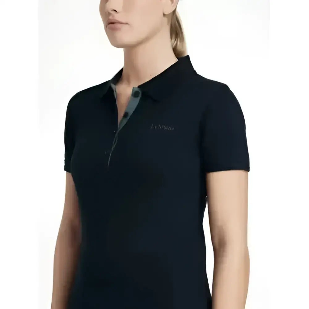 Black lemieux classique polo shirt with short sleeves subtle chest logo and gray inner collar detail