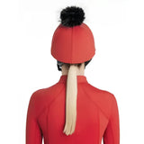 Red lemieux classique pom equestrian helmet with a black faux fur pom hat silk chilli on top