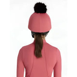 Pink lemieux classique pom equestrian helmet with black faux fur pom hat silk cranberry top detail