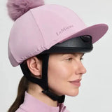 Pink lemieux classique pom equestrian helmet cover with fluffy lavender faux fur pom in silk fondant material