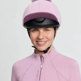 Soft pink lemieux classique pom equestrian helmet with silk fondant finish and matching faux fur pom on top