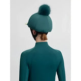 Teal lemieux classique equestrian helmet with fluffy green faux fur pom in silk jungle style