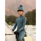 Teal lemieux classique equestrian helmet with a matching silk jungle faux fur pom for riding style and comfort