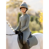Gray lemieux classique pom riding helmet with fluffy white pom hat silk rosemary on top