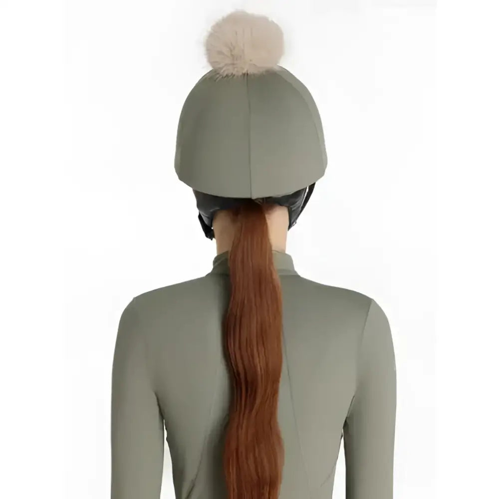 Olive green lemieux classique pom equestrian helmet with fluffy beige pom hat silk rosemary on top