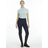 Light blue lemieux classique short sleeve classic equestrian top with high collar and front zipper aqua base layer