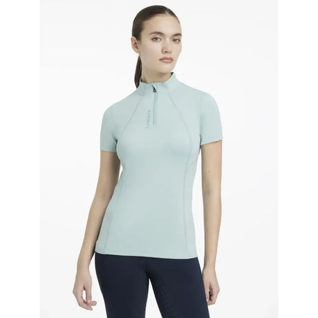 Lemieux classique aqua base layer short sleeve classic athletic top in light blue with quarter zip and subtle logo