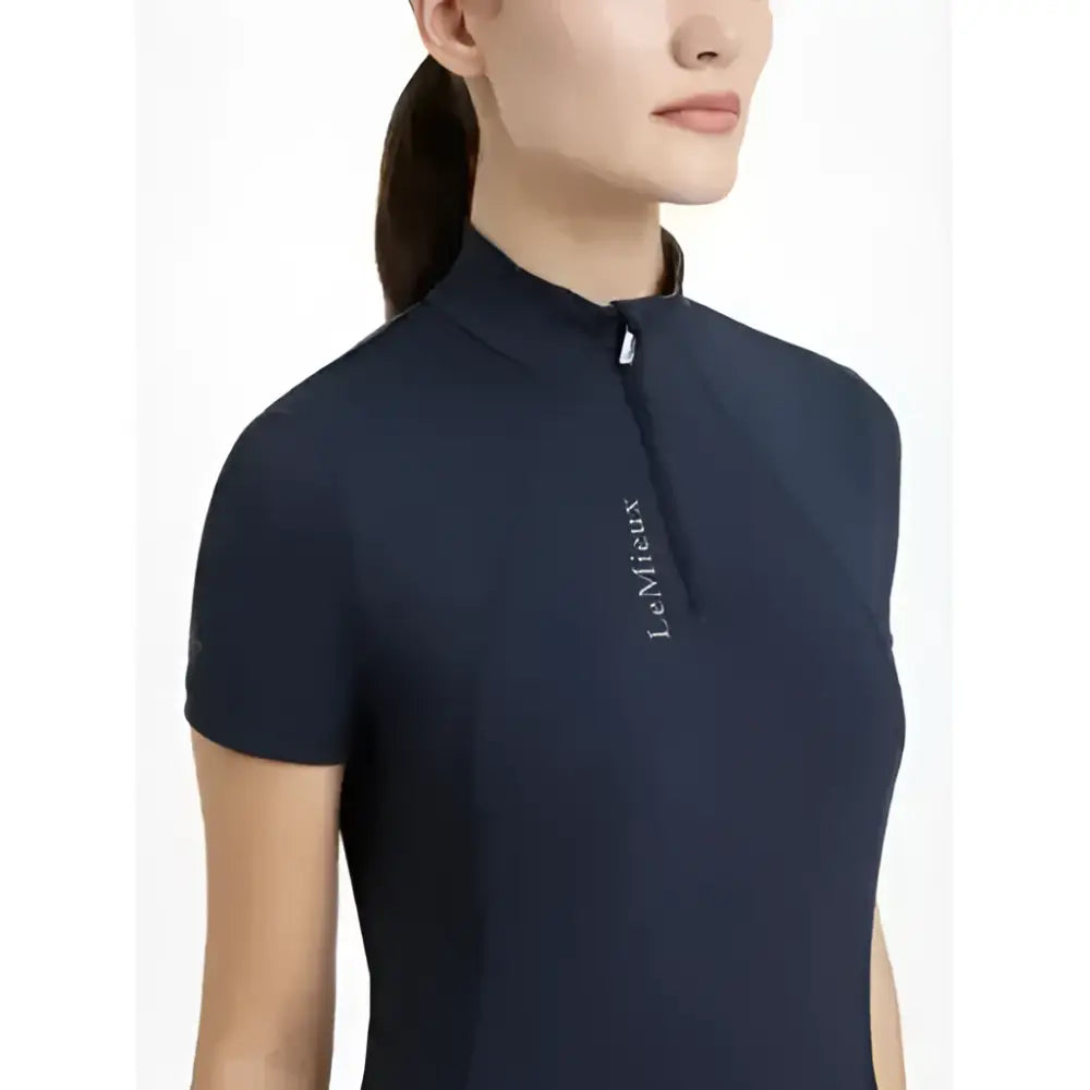 Dark navy lemieux classique polo with subtle zippered collar and embroidered logo perfect classic short sleeve base layer navy