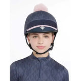 Navy blue lemieux clea hat silk dusk with a pink pom-pom and matching stripe for equestrian use