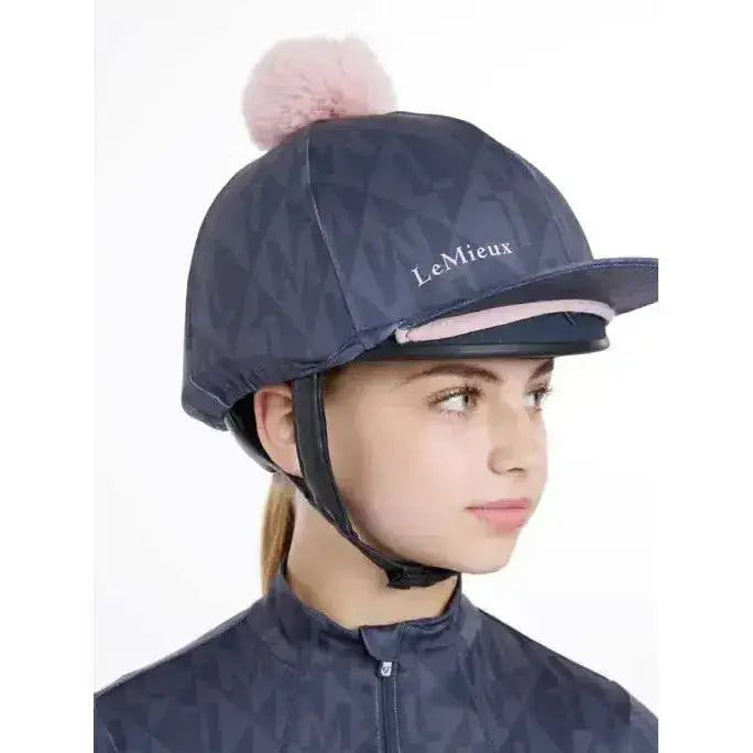 Navy blue geometric lemieux clea hat silk dusk with pink pom-pom and lemieux logo embroidered in white