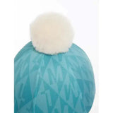 Teal lemieux clea hat knit beanie with white fluffy pom pom in hat silk lagoon perfect for cozy wear