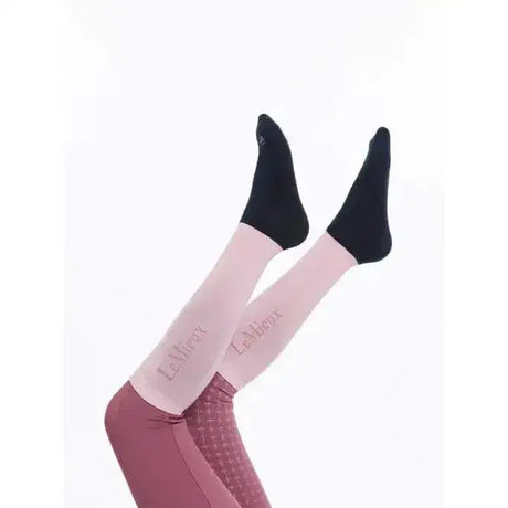 Pink and black lemieux competition socks with sleek compression design in a 2 pack for performance and comfort