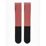 A pair of lemieux competition socks in cranberry coral and black with subtle text pattern on the upper section