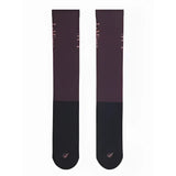 A pair of lemieux competition socks in dark purple and black with a subtle pink logo at the toe for competition use