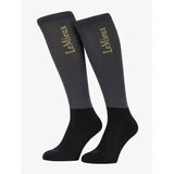 Black and charcoal gray lemieux competition socks pack dusk blue with subtle gold logo on the upper leg