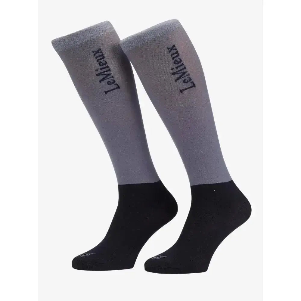 Gray and black two-tone lemieux competition socks with flexible four-way stretch pack jay blue detail on upper leg