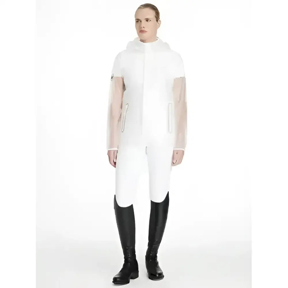 White transparent lemieux competition waterproof jacket clear with sheer sleeves, hood, and green zipper accents