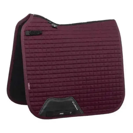 Maroon quilted lemieux cotton dressage square burgundy saddle pad with black trim and branded logo patch
