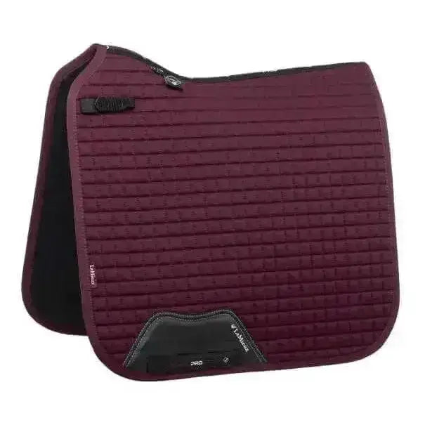 Maroon quilted lemieux cotton dressage square burgundy saddle pad with black trim and branded logo patch