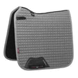 Gray quilted lemieux cotton dressage square with black trim and branded logo patch for dressage use