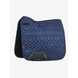 Navy lemieux crystal suede dressage pad with quilted texture black trim and lamotte prosport branding