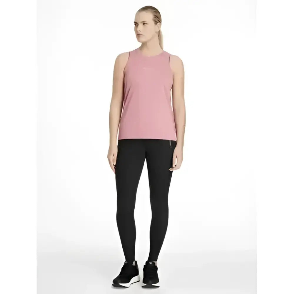 A soft pink sleeveless athletic top with a subtle logo paired with lemieux dani sport legging black made from lightweight fabric