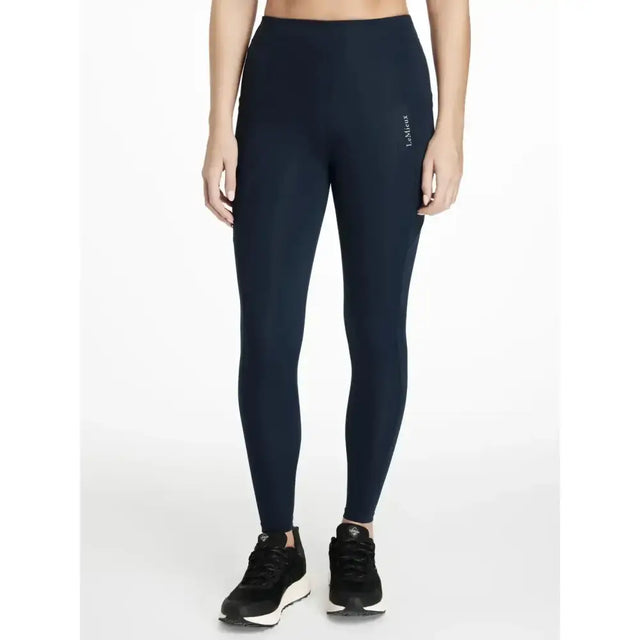 Navy blue high waisted lemieux dani sport legging with subtle side seam logo perfect for activewear