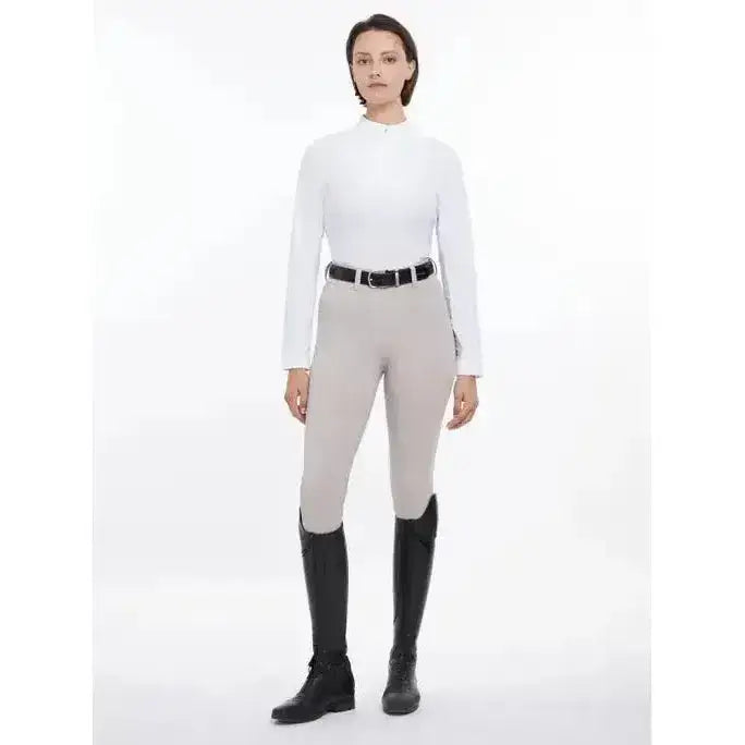 White long-sleeved riding shirt with high collar and side seam detailing from lemieux demi bregging stone collection