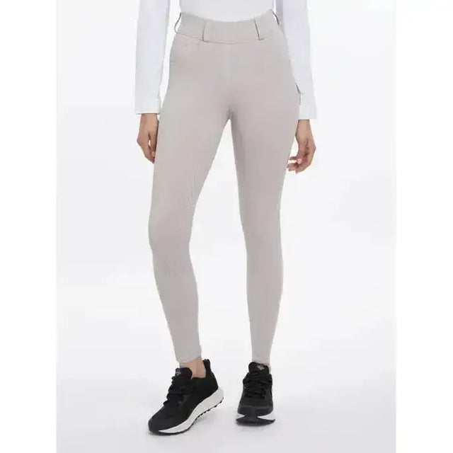 Beige high-waisted lemieux demi bregging stone riding leggings with a sleek form-fitting design and subtle stitching details