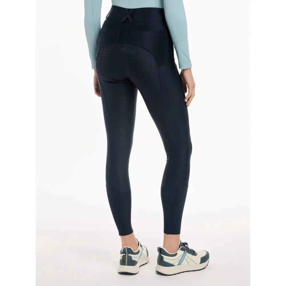 Black high-waisted lemieux demi pull breggings navy showing back with subtle textured full-seat silicone grip