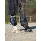 Black lemieux derby projump fetlock boot with sleek padded design and adjustable straps for horse leg protection