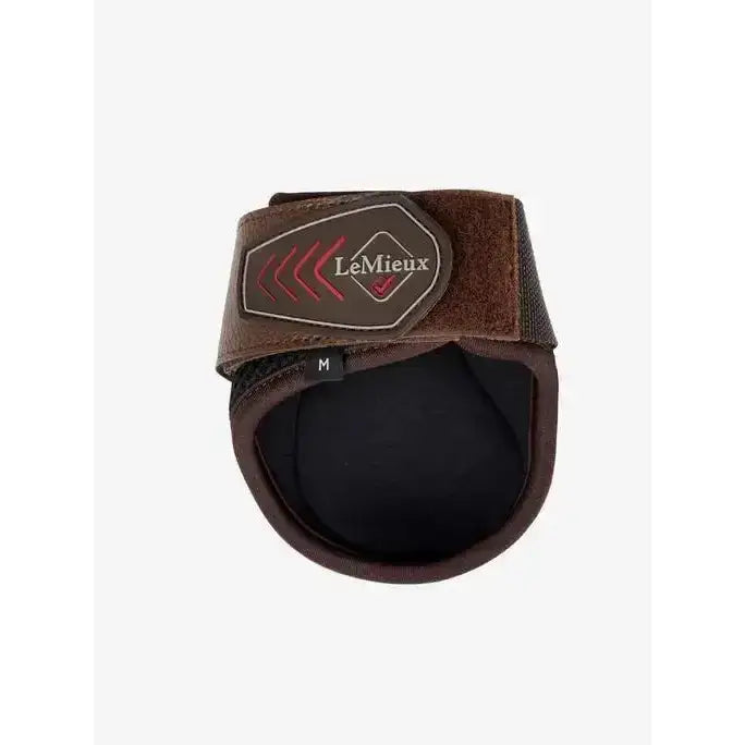 Brown lemieux derby projump fetlock boot with padded interior and adjustable strap for horse hoof protection