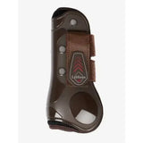 Brown leather and plastic lemieux derby projump tendon boot with red logo patch for horse leg protection