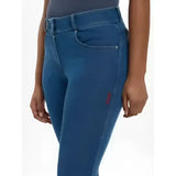 Blue denim high-waisted jeans with subtle purple logo on thigh from lemieux dolly denim breech collection