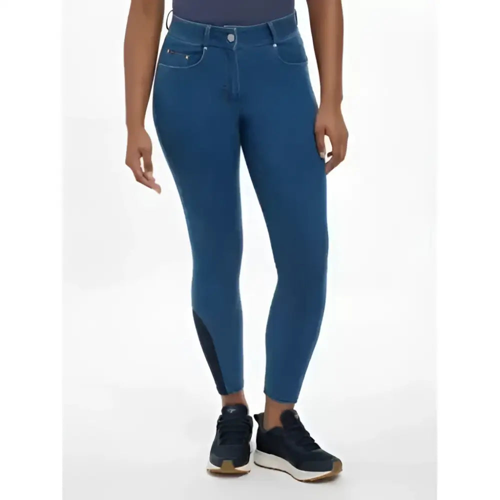 Blue denim riding pants with black side panels and high waist from lemieux dolly denim breech collection