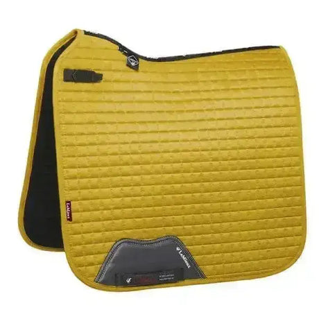 Yellow quilted lemieux dressage suede square saddle pad with black trim and dark gray reinforced patch dijon color