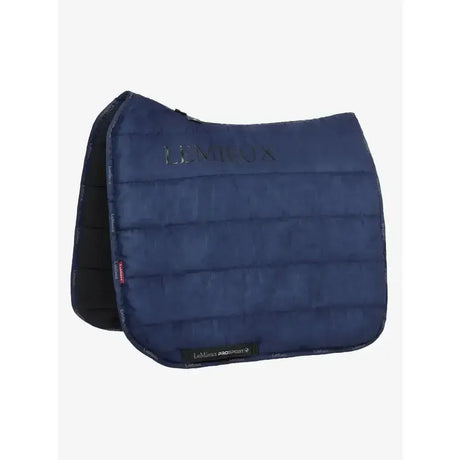 Navy blue lemieux dressage work pad with quilted texture black trim and subtle logo perfect for work pad controls