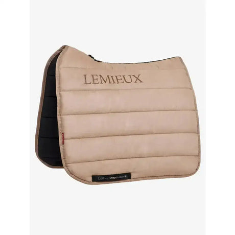 Beige quilted lemieux dressage work pad with black underside featuring lemieux branding and work pad controls