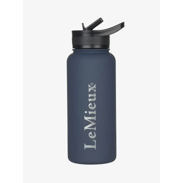 A matte navy blue lemieux drinks bottle with a black flip-top lid designed to keep drinks cold