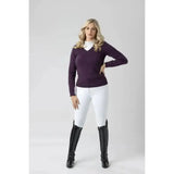 Purple v-neck long-sleeved sweater over white shirt paired with lemieux drytex waterproof breeches with knee grip