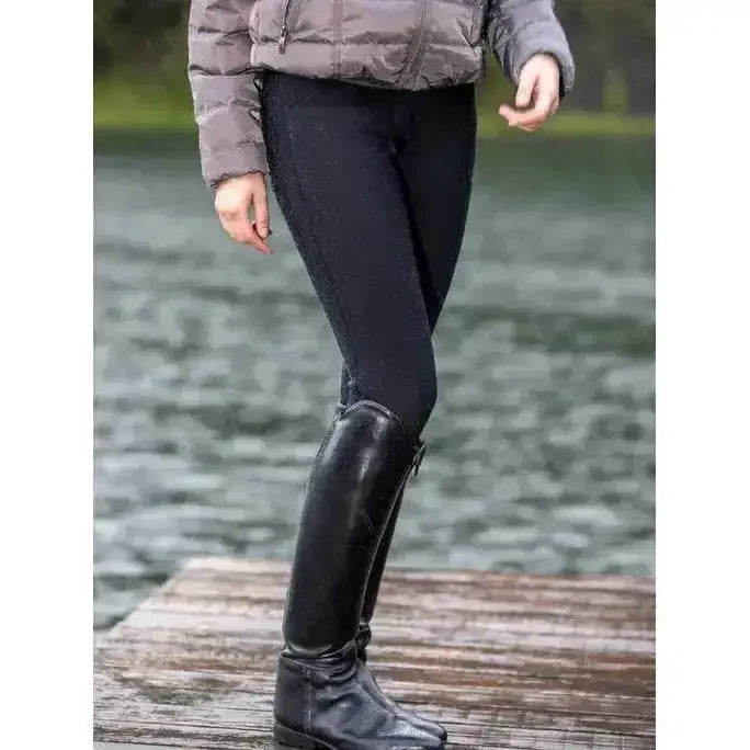 Black leather riding boots with glossy finish and zipper closure paired with lemieux drytex waterproof breeches black