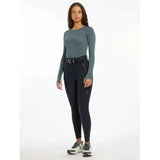 Black lemieux drytex waterproof breeches with sleek fit and subtle red branding for all-weather riding use