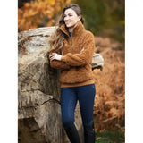 A cozy rust-colored fleece jacket with high collar and quarter-zip perfect for lemieux drytex all-weather riding gear