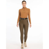 Woman wearing Lemieux Drytex Waterproof Breeches Knee Grip Alpine in stylish outfit